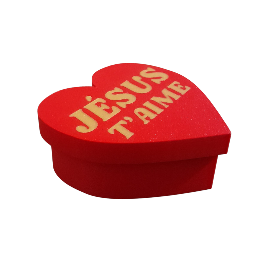 Boîte "cadeau" de taille 10 cm x 10 cm * 7 cm avec la mention "Jésus t'aime"