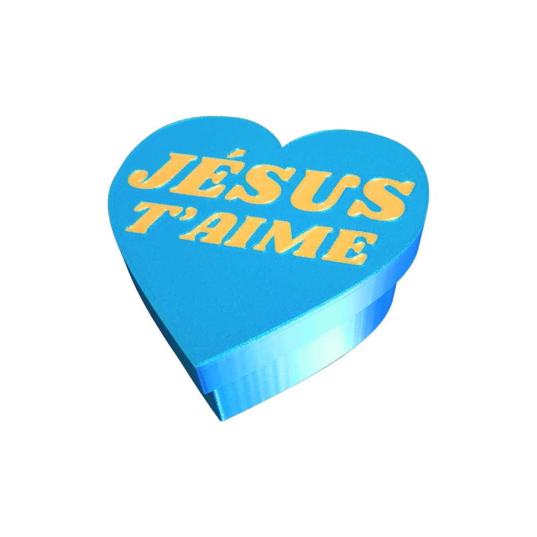 Boîte "cadeau" de taille 10 cm x 10 cm * 7 cm avec la mention "Jésus t'aime"